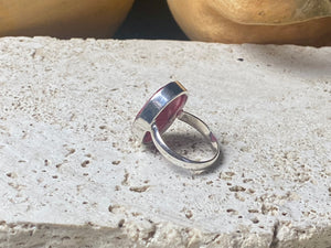 Our large facet cut ruby is set in a simple sterling silver bezel to show off the beauty and size of the stone. This is a statement ring that can be worn be either men or women. Measurements: Ruby 2 x 1.5 cm Size 8.5 | 18.75 mm