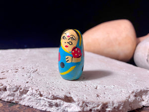 Novelty beads perfect for beading projects or as little doll statues. Made from lightweight wood and hand painted in the style of babushka dolls but with an Indian twist, our wood beads are great gifts for kids. Light enough to be worn as earrings. Perfect for a jewellery project. Height 2.6 cm, width 1.5 cm