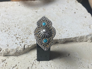 beautiful statement ring made by a Rajasthani village silversmith just outside of Jaipur. Sterling silver and blue ceramic beads with hand wired (not cast) filigree face decoration. Rajasthan, India. Looks great on a man's hand or woman's hand. Measurements: Face 4 cm x 2.5 cm Size 9.25 | 19.25 mm