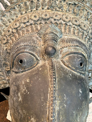 Ceremonial dancer's headpiece worn as a mask in the form of Vishnu's incarnation as Varaha. For ritual use in annual Dharmanema dance festivals. Early 20th century. Bronze lost wax casting. From Kerala, southern India. Measurements: Width 51 cm, height 43 cm, depth 32 cm.