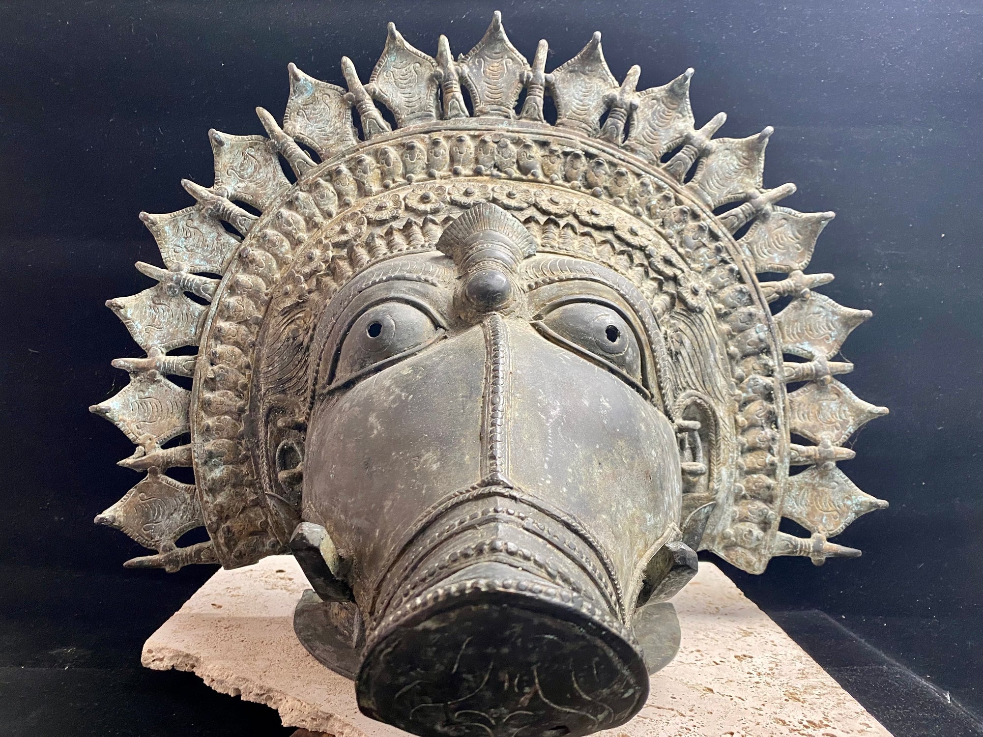Ceremonial dancer's headpiece worn as a mask in the form of Vishnu's incarnation as Varaha. For ritual use in annual Dharmanema dance festivals. Early 20th century. Bronze lost wax casting. From Kerala, southern India. Measurements: Width 51 cm, height 43 cm, depth 32 cm.