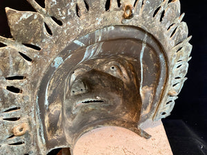 Ceremonial dancer's headpiece worn as a mask in the form of Vishnu's incarnation as Varaha. For ritual use in annual Dharmanema dance festivals. Early 20th century. Bronze lost wax casting. From Kerala, southern India. Measurements: Width 51 cm, height 43 cm, depth 32 cm.