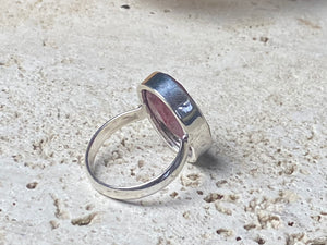 Our large facet cut ruby is set in a simple sterling silver bezel to show off the beauty and size of the stone. This is a statement ring that can be worn be either men or women. Measurements: Ruby 2 x 1.5 cm Size 8.5 | 18.75 mm