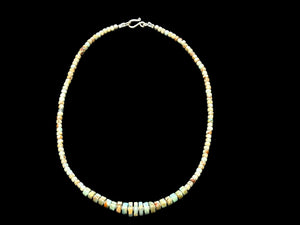 Choker necklace of graduated heshi cut pale blue amzonite, separated by sterling spacers. Sterling silver clasp. 42.5 cm length, beads 3-9 mm diameter