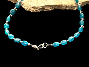Deep blue apatite beads meet vintage Indian silver. Boulder-cut stones graduated and highlighted with silver accents, sterling silver hook clasp. Length 52 cm