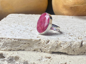 Our large facet cut ruby is set in a simple sterling silver bezel to show off the beauty and size of the stone. This is a statement ring that can be worn be either men or women. Measurements: Ruby 2 x 1.5 cm Size 8.5 | 18.75 mm