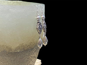 Lush baroque earrings are large in size but easy to wear. Sterling silver handmade beads, the centrepiece of which features gold look detailing in brass. Length including hook 6 cm