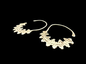 Berber hoop earrings with ornamented crescent edged with trefoil projections. High grade silver. Tunisia. Early 20th C or earlier. Width 3 cm, height 4.2 cm
