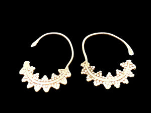 Berber hoop earrings with ornamented crescent edged with trefoil projections. High grade silver. Tunisia. Early 20th C or earlier. Width 3 cm, height 4.2 cm