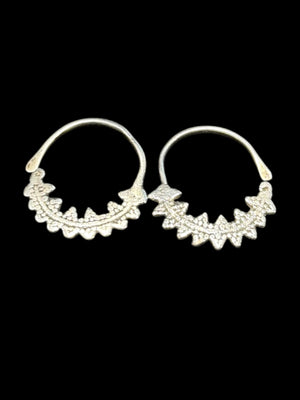 Berber open hoop earrings with ornamented crescent edged with trefoil projections. High grade silver. Tunisia. Early 20th century or earlier. Diameter 3.7 cm