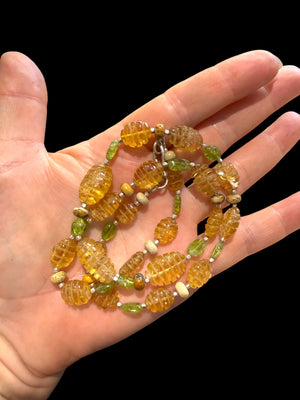 Stunning natural bead necklace of graduated, etched golden citrine, peridot & jasper beads, highlighted with handmade sterling silver beads and clasp. Length 54.7 cm.