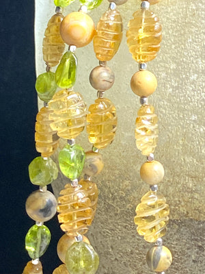 Stunning natural bead necklaces made up of graduated, etched golden citrine, peridot & jasper beads, highlighted with handmade sterling silver beads and clasp.