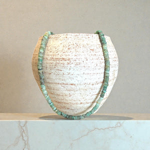 Heshi cut natural emerald necklace features sterling silver findings and a hook clasp. Length 43.5 cm.