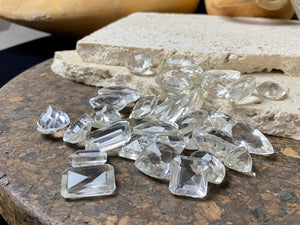 Natural rock crystals facet cut into gems of the highest quality and clarity. Approximately 1.5 - 2.5 cm length