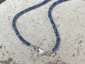 Beaded sapphire necklace made up of finely graduated, matched facet-cut African blue sapphires. The necklace is finished with a sterling silver lobster clasp. This is a unisex necklace - perfect for men or women. Length 45.5 cm (17.85")