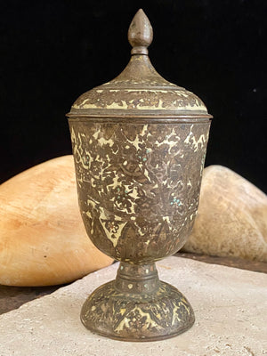 Russian Orthodox church communion chalice. Early 20th century. Engine turned brass with elaborate inlay enamel decoration in white with blue and red highlights. The enamel work is very worn and rubbed in places. Height 15 cm, width 6.5 cm.