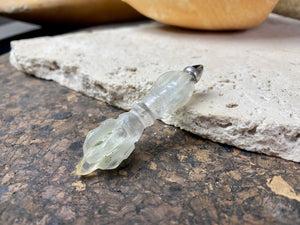 Hand carved rock crystal dorje or vajra pendants. Top mounted sterling silver bail. Approximately 6 cm in length and carved from Himalayan quartz.