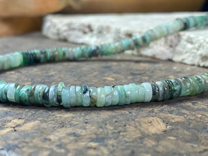 Heshi cut natural emerald necklace features sterling silver findings and a hook clasp. Length 43.5 cm.