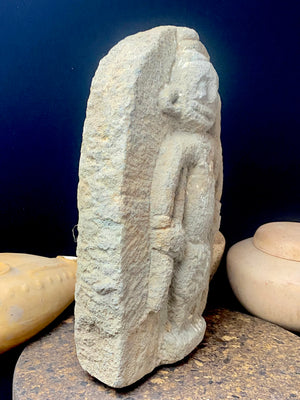 Antique Indian village carving, most likely tribal Bhastar or Kondi. This stele relief carving depicts a very rudimentary image of Shiva, identified by his trident. A village artefact collected from Orissa province, this type of statue would guard the road into and out of the village, enclosed in a small shrine. Height 29.5 cm x width 23 cm x depth 7 cm