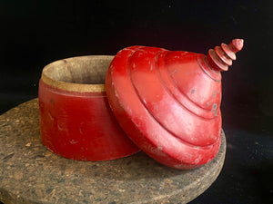 Large red lacquered tikka pot or tikka boxes. Hand carved from single hollowed out pieces of teak, these lidded pots traditionally hold the red vermillion (bindi) powder used for marking the forehead during Hindu ceremonies. They date to the early 1900s. Measurements: approximate diameter 12-14 cm, height 16-18 cm 