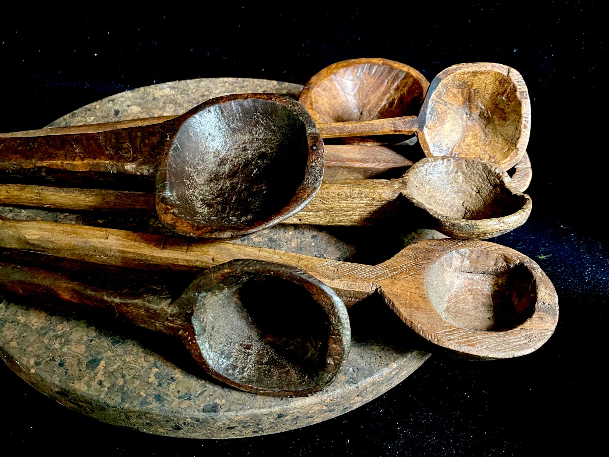 Vintage wood serving spoons or ladle, often used to serve dhal and biriyani dishes. Hand carved hardwood, mostly teak. From northern India. Our spoons have a lovely worn patina commensurate with their age. Each piece is hand carved, unique and artisan made. Measurements: length 35-40 cm, width of spoons 7-9 cm.