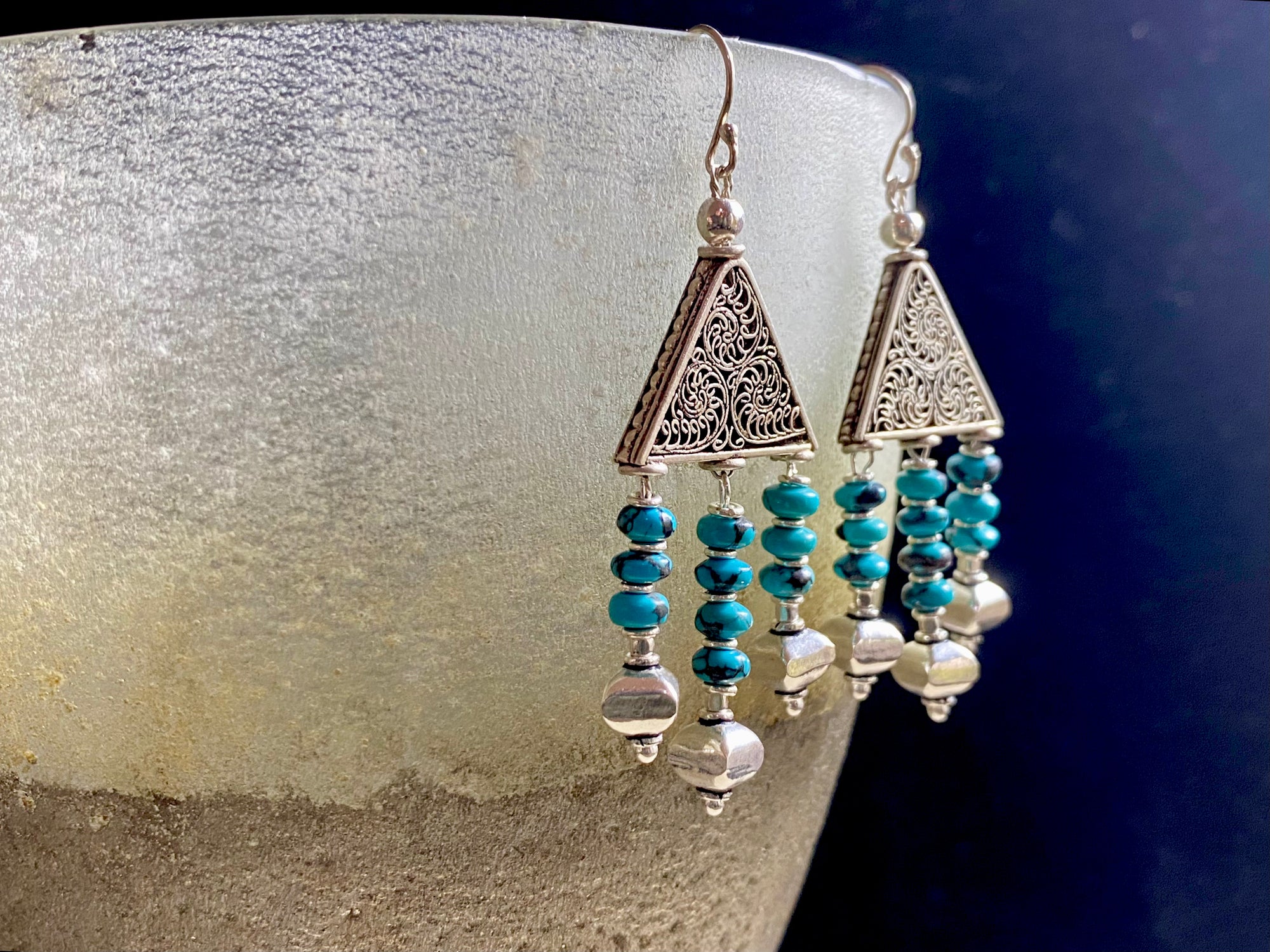 Stylish 3 strand chandelier earrings made from turquoise and sterling silver handmade chandelier pieces, detailing and hooks. Stunning, with an ancient Roman look and feel. Measurements: Length approximately 6.8 cm with hook
