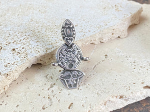 Stunning tribal ring from regional Rajasthan, India. High grade or sterling silver. Adjustable back so it will fit a number of different finger sizes. Measurements: Ring face: 4.5 x 2.6 cm Size: Anywhere from size 6 to size 8, this ring is adjustable