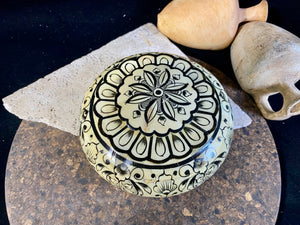 A beautiful low oval lidded bowl or box, traditionally called an opium pot because of its shape. Crafted from hand shaped panels of camel bone over wood, then hand painted. Hand made in Rajasthan, India. Measurements: diameter 15.5 cm, height 6.5 cm. 