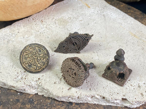 Made from a copper bronze alloy, these east Indian temple stamps are made via the lost wax method of casting and are called Chhapa stamps. They originate in Orissa and Bengali temples, India - ca. 1900.