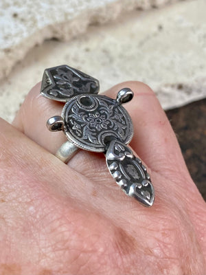 Stunning tribal ring from regional Rajasthan, India. High grade or sterling silver. Adjustable back so it will fit a number of different finger sizes.  Measurements:  Ring face: 4.5 x 2.6 cm Size: Anywhere from size 6 to size 8, this ring is adjustable
