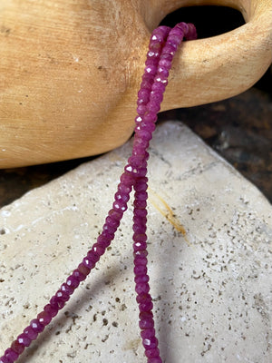 Beaded ruby necklace made up of finely graduated, matched facet-cut natural rubies. The necklace is finished with a sterling silver lobster clasp. This is a unisex necklace - perfect for men or women. Length 42 cm (16.5")