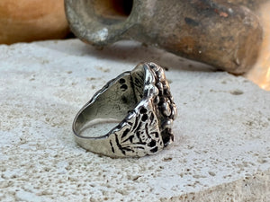 Vintage silver Ganesh ring from Rajasthan, India, weighing over 15 grams. A beautiful depiction of Lord Ganesha with small open piercings to each side of Ganesh and an image of the Tree of Life on the back. This is a stunning silver ring that can worn by men or women. Ganesh: 2 x 1.7 cm Size: 18.25 mm| Size 8