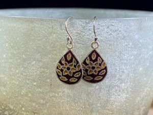 Beautiful hand crafted enamel and sterling silver dangle earrings from Jaipur, India. Lightweight and easy to wear, with sterling silver hooks. Plain silver backs. 3 cm drop including hook, the enamelled panel is 2 cm in length