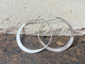 Hand made tribal sterling silver hoop earrings with wrapped silver wire detailing. 4.5 cm diameter