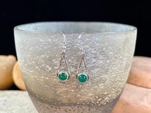 Simply elegant earrings with an art deco style, crafted from natural cabochon gemstones. Sterling silver surrounds and hooks complete the look. Length including hook 4.7 cm