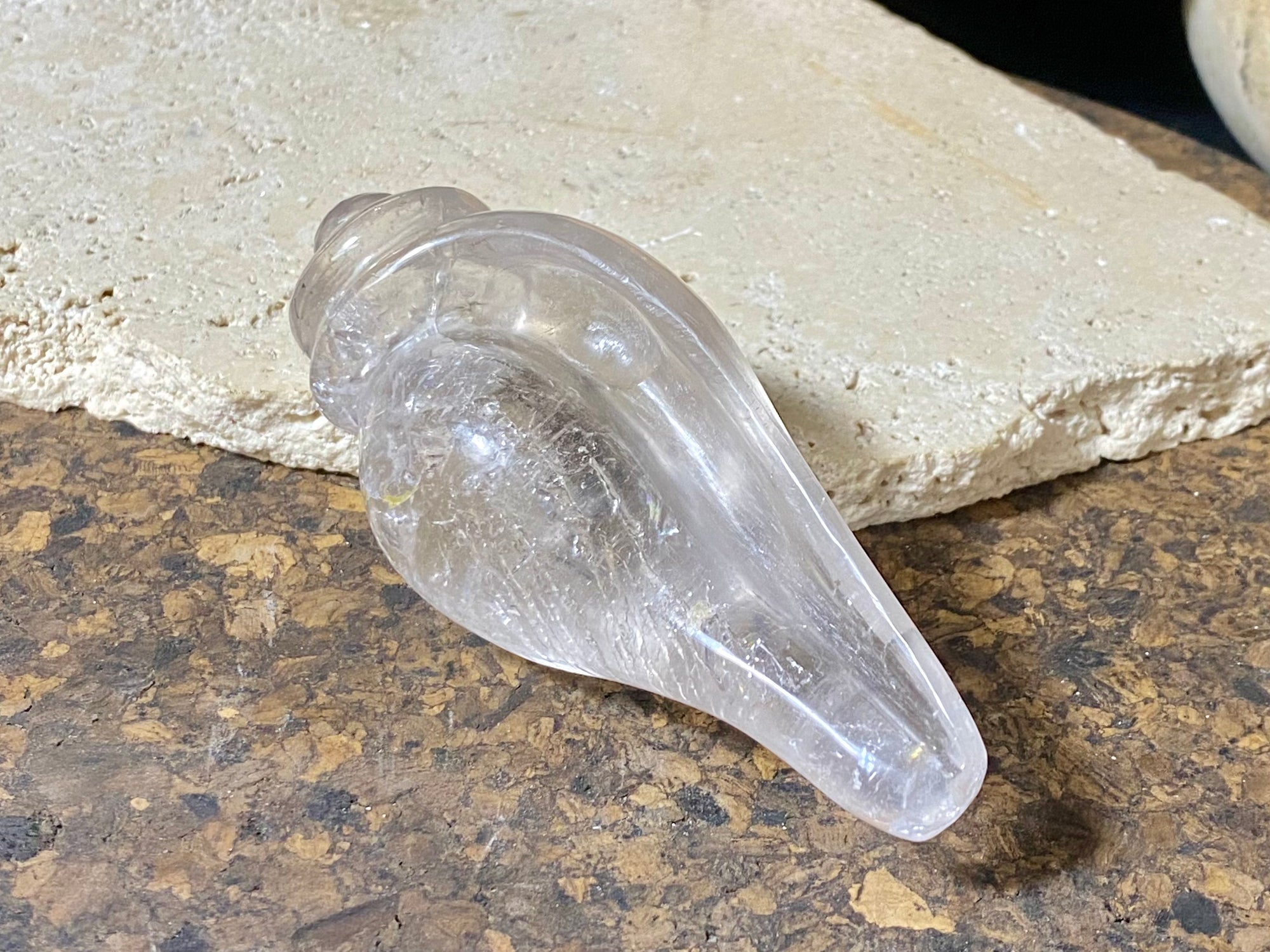 Hand carved conch shell. This vintage piece is carved from a solid piece of Himalayan rock crystal (quartz). The conch shell is sacred to both Hindus and Buddhists. Hand carved in Nepal. Measurements: length 10 cm, width at widest point 4.5 cm