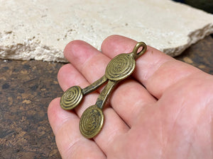 Antique spiral Naga pendant. Bronze, lost wax casting. Dates to the 1920's or earlier.