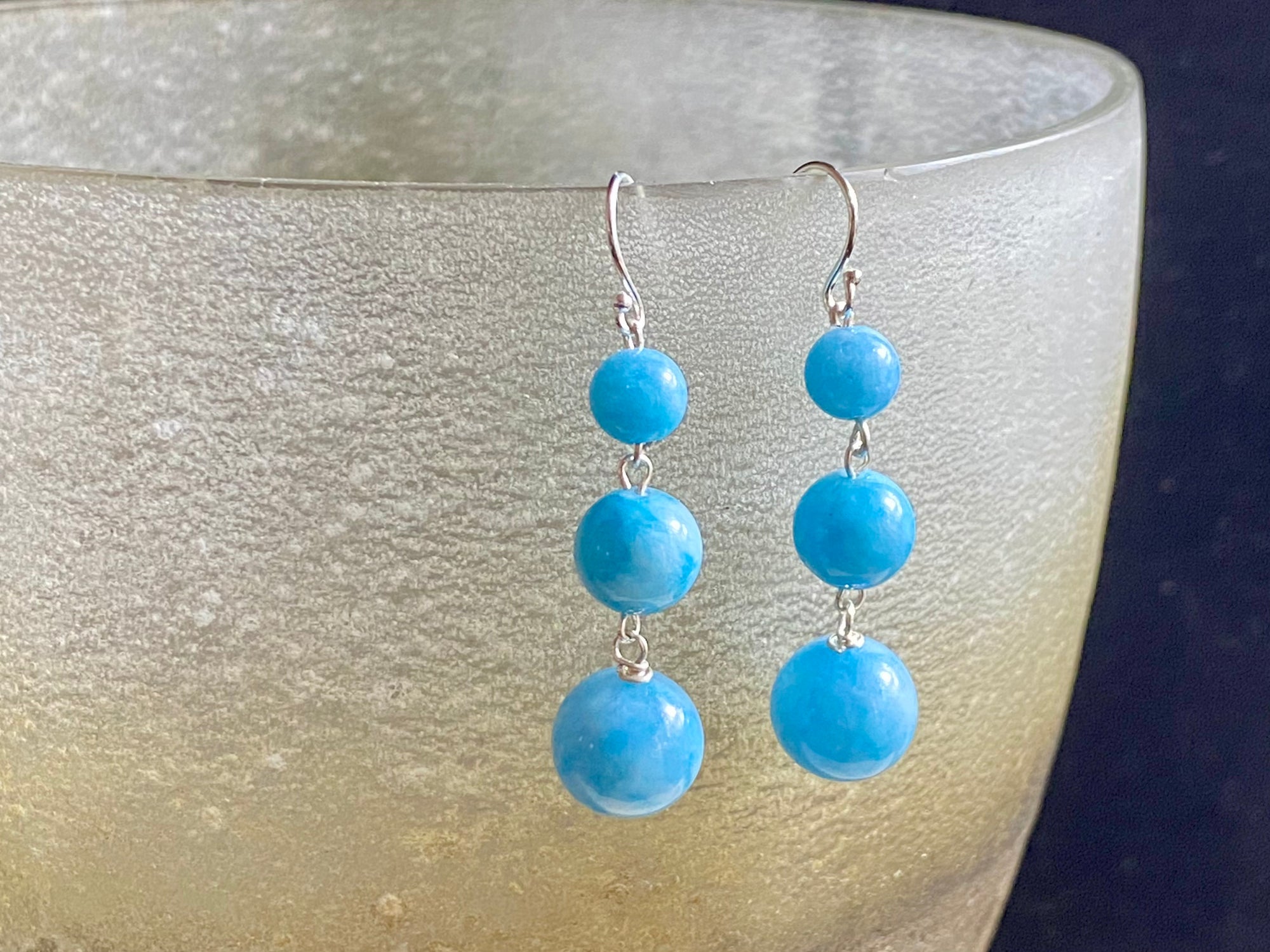 Simple three drop blue chalcedony earrings finished in sterling silver with sterling silver hooks. Elegant and simple earrings and one of most popular designs. Measurements: 4.7 cm (1.75") length including hook
