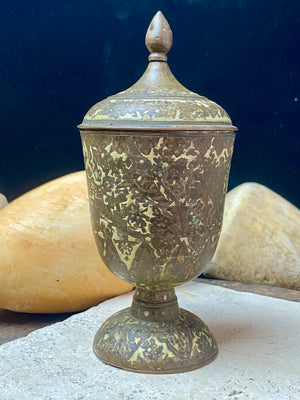 Russian Orthodox church communion chalice. Early 20th century. Engine turned brass with elaborate inlay enamel decoration in white with blue and red highlights. The enamel work is very worn and rubbed in places. Height 15 cm, width 6.5 cm.