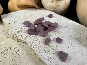 Natural rubies. Uncut and unpolished. Each ruby is unique and will bring its own character to your crystal collection. Approximate size of each stone  Large: between 2 and 3 grams. length around 1.5 cm Small: between 1 and 2 grams, length around 1 cm Select your preferred size from the drop down menu. Price is per single piece and we will select a piece to send you.