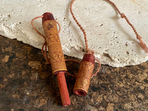 This is a vintage wood sewing needle case from northern Thailand, from the Ahka tribe. This beautiful, old and rare vintage piece is highly decorated and made from bamboo, etched, stained with red betel juice and. Length 8.5 cm.