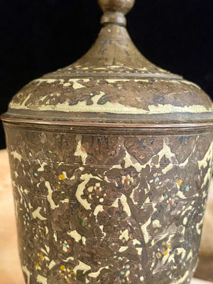 Russian Orthodox church communion chalice. Early 20th century. Engine turned brass with elaborate inlay enamel decoration in white with blue and red highlights. The enamel work is very worn and rubbed in places. Height 15 cm, width 6.5 cm.