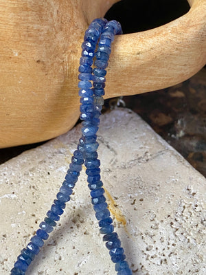 Beaded sapphire necklace made up of finely graduated, matched facet-cut African blue sapphires. The necklace is finished with a sterling silver lobster clasp. This is a unisex necklace - perfect for men or women. Length 45.5 cm (17.85")