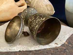 Russian Orthodox church communion chalice. Early 20th century. Engine turned brass with elaborate inlay enamel decoration in white with blue and red highlights. The enamel work is very worn and rubbed in places. Height 15 cm, width 6.5 cm.