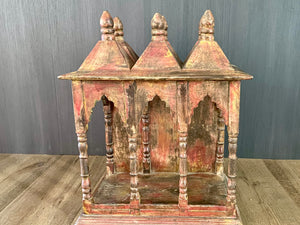 Solid timber shrine, nicho or display box, with three sections or bays,  beautifully carved and finished on three sides and inside with carved pillars, solid wood back, stepped up footing and peaked roof with finial. Most likely teak. Dates from the 1950-60s, southern India. Height 47.5 cm, depth 25 cm, width 38 cm