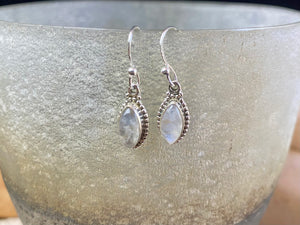 Simply elegant leaf shaped earrings with a beautifully detailed bezel to show off the natural beauty of the cabochon stones. Sterling silver hooks complete the look. Our earrings are open-backed to allow natural light to show through. Length including hook 2.7 cm