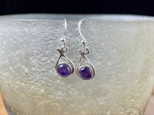 Simply elegant earrings with a difference. Sterling silver hooks complete the look. Our earrings are open-backed to allow the natural light of the cabochon stones to show through. Length including hook 2.7 cm