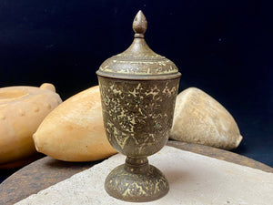 Russian Orthodox church communion chalice. Early 20th century. Engine turned brass with elaborate inlay enamel decoration in white with blue and red highlights. The enamel work is very worn and rubbed in places. Height 15 cm, width 6.5 cm.