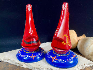 Always losing your glasses and sunglasses at home? We have the solution. Hand crafted from lightweight wood, these very cool little guys are traditionally called chasma stands and they will make sure you never misplace your sunglasses or glasses again. From India Measurements: height 15 cm