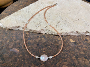 Natural clear pink/orange sunstone bead necklace is teamed with cultured pearls and sterling silver detailing. A silver lobster clasp complete the look. Length 40.5 cm